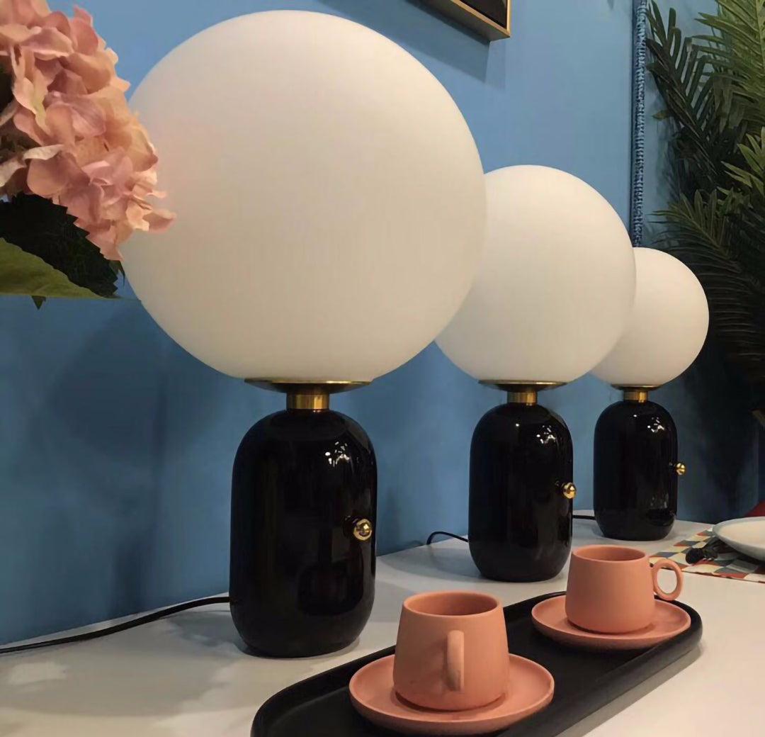 Nyxen Industrielle Tischleuchte aus Glas