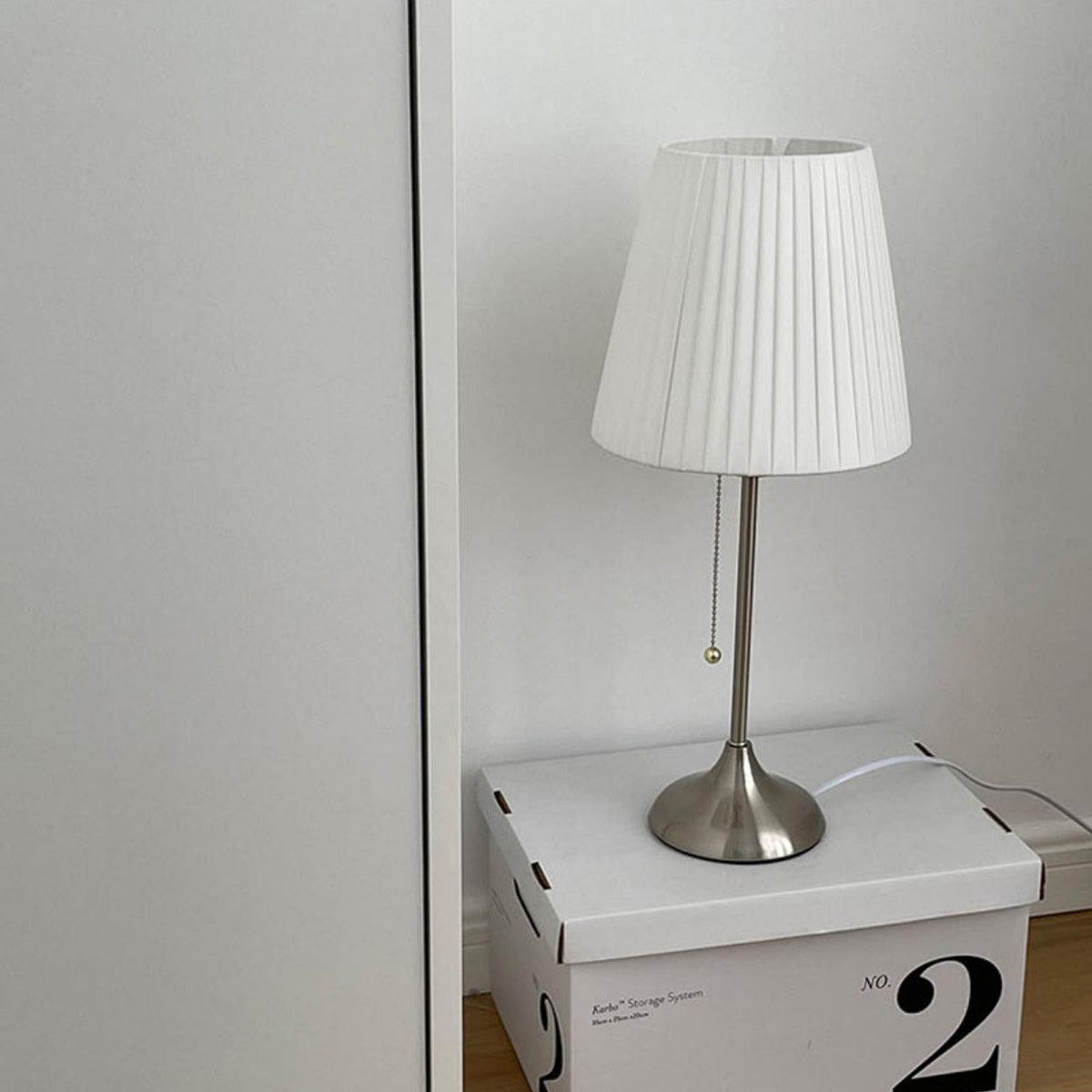 Simplicity Tischleuchte aus gefaltetem Stoff