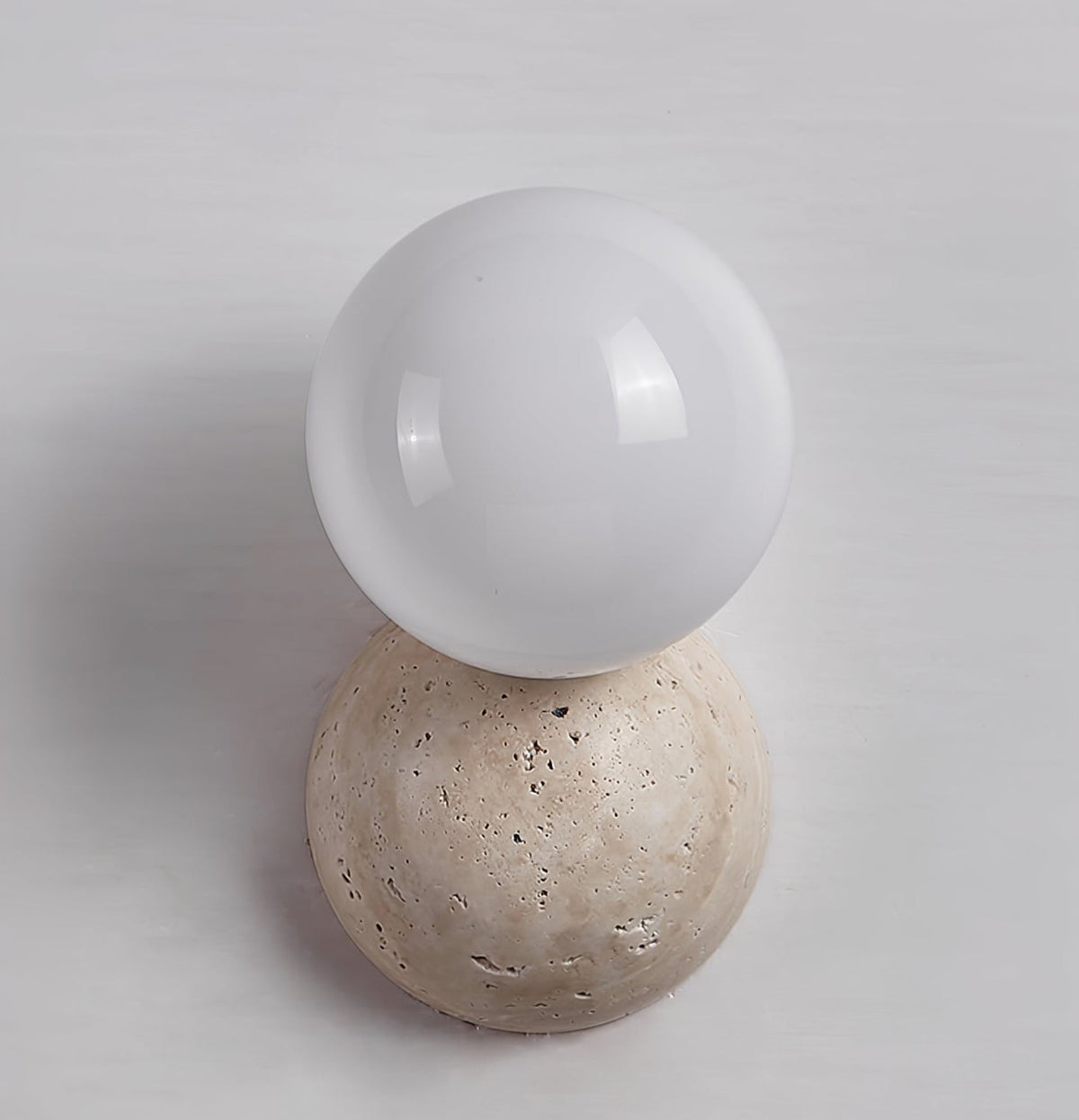 Cethair Travertine-Wandleuchte