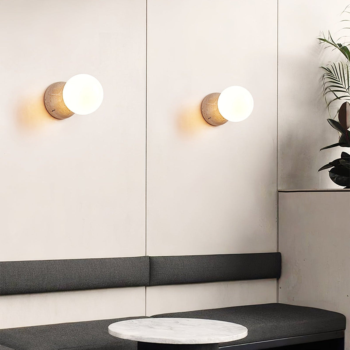 Cethair Travertine-Wandleuchte