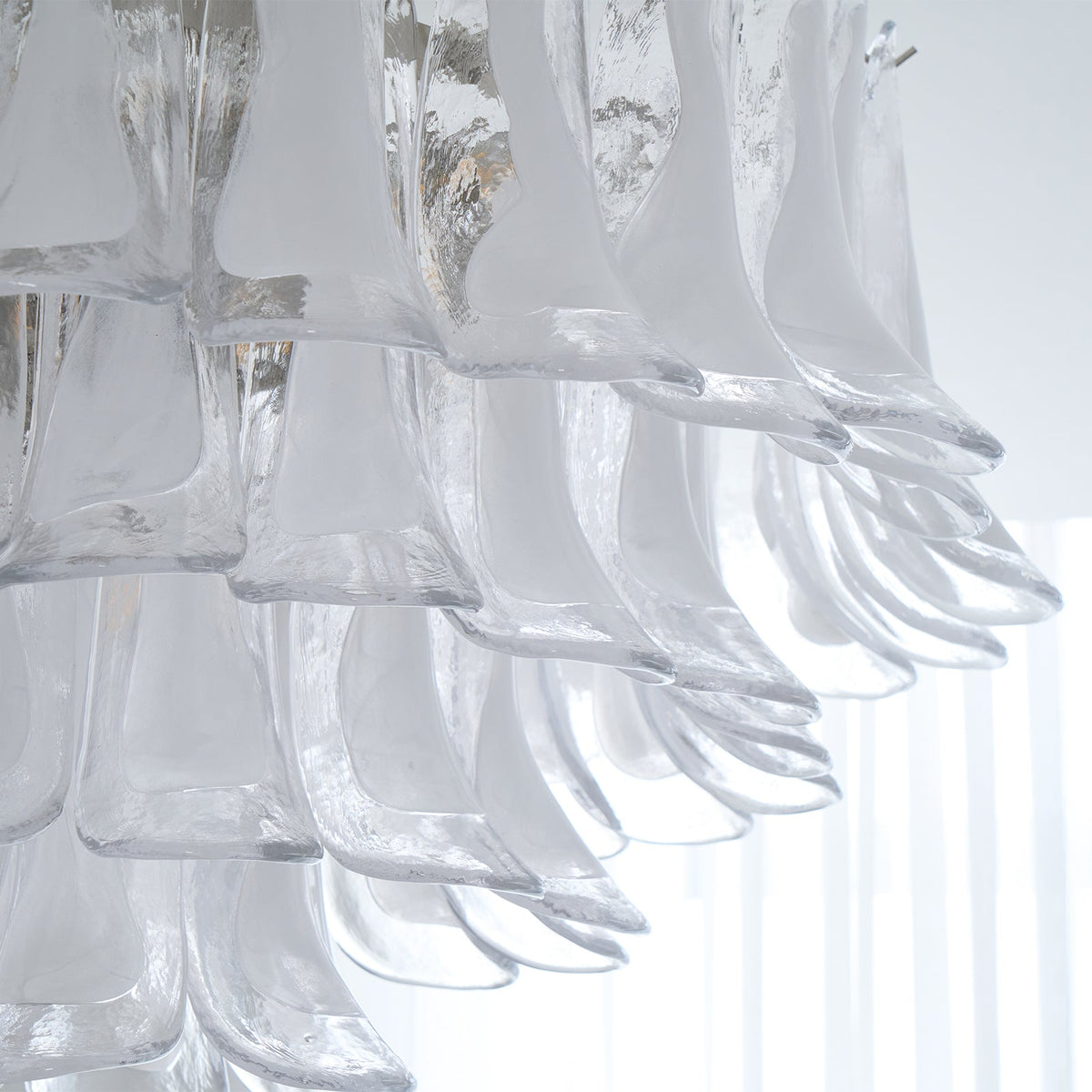 Celenira Deckenleuchte aus klarem Glas Wellenform geschichtet elegant