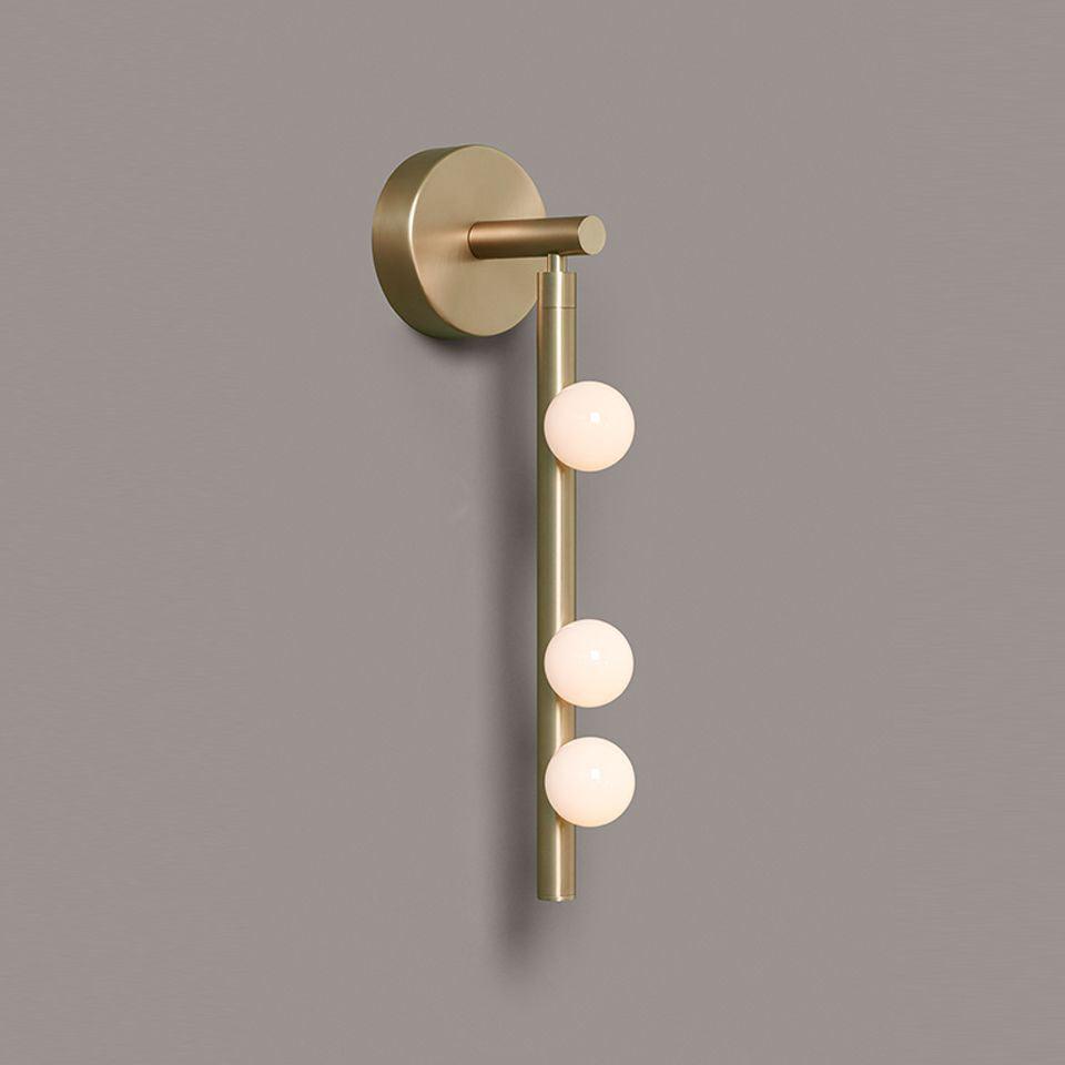 Rory zeitgenössische minimalistische Röhren-Wandleuchte aus Messing und Glas