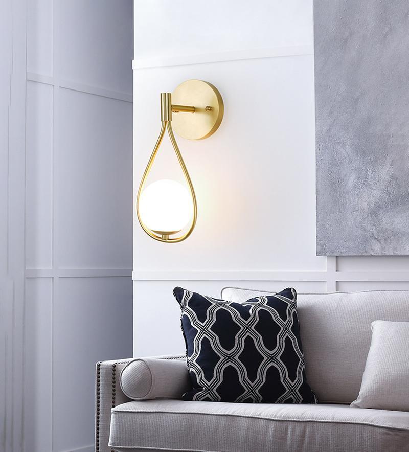Eiralaya zeitgenössische minimalistische Wandleuchte aus Messing mit Glas für das Badezimmer | Cielum