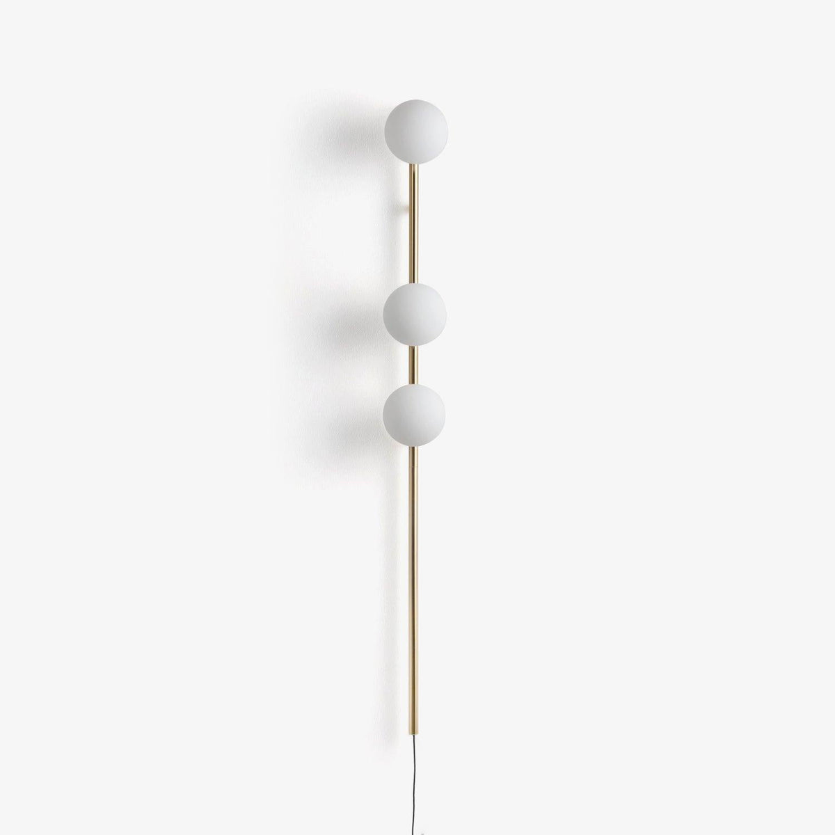 Ultheia zeitgenössische minimalistische Wandleuchte aus Glas in Kieselsteinform