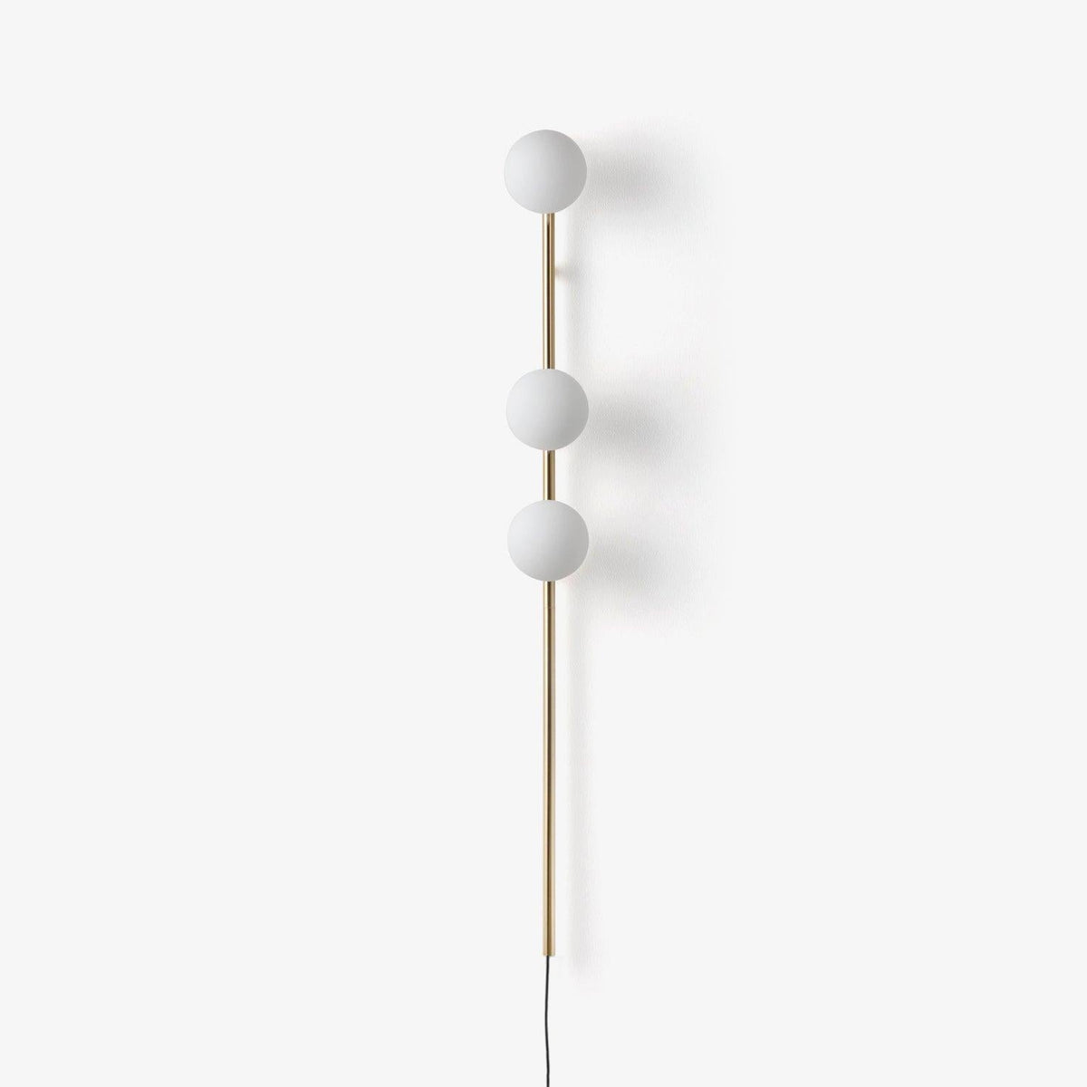 Ultheia zeitgenössische minimalistische Wandleuchte aus Glas in Kieselsteinform