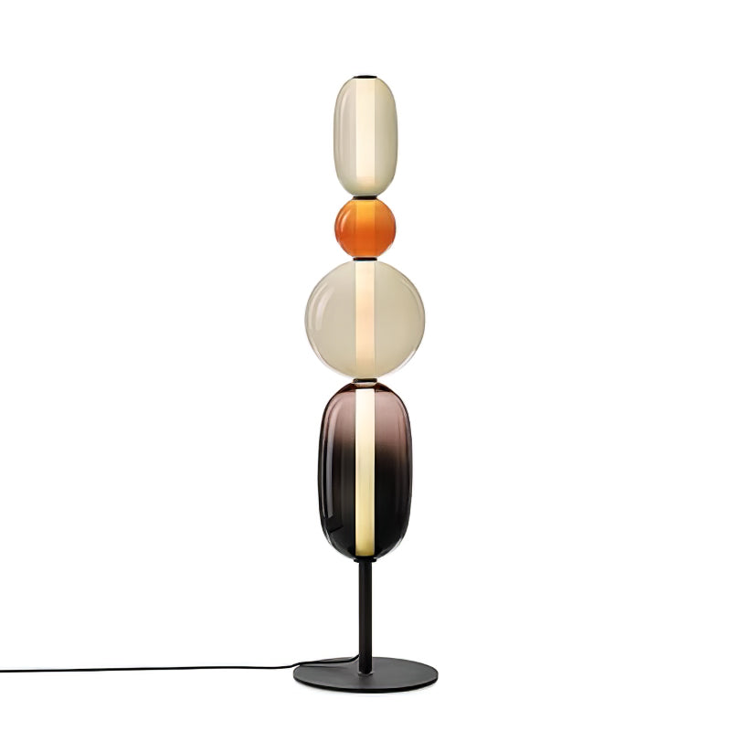 Velarelle Stehleuchte aus Glas in Kieselsteinform