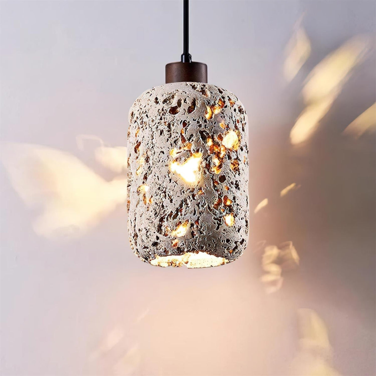 Caliora Pendelleuchte aus Travertin in Zylinderform modern