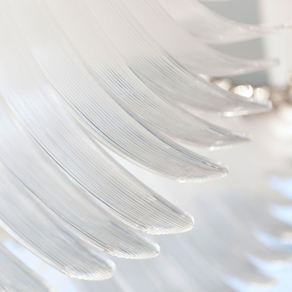 Eurrinia Kronleuchter aus Glas mit Flügelmotiv