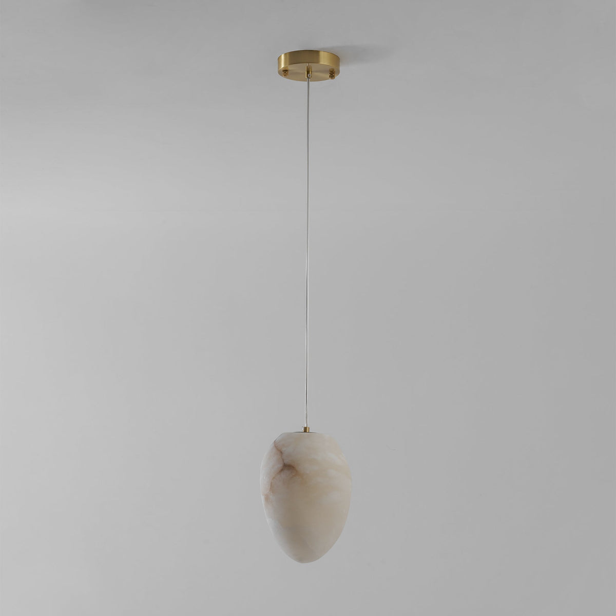 Nivisaya Pendelleuchte in Kieselsteinform aus Alabaster