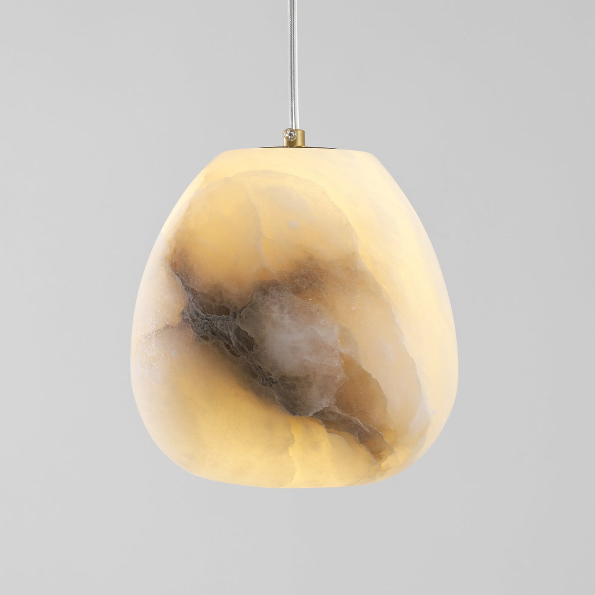 Nivisaya Pendelleuchte in Kieselsteinform aus Alabaster