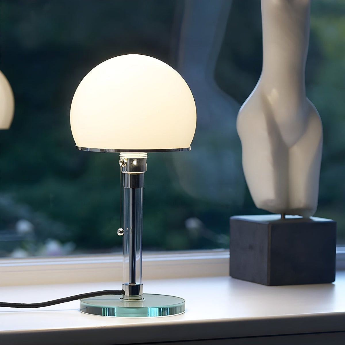Fane Tischleuchte aus Glas mit künstlerischem Design