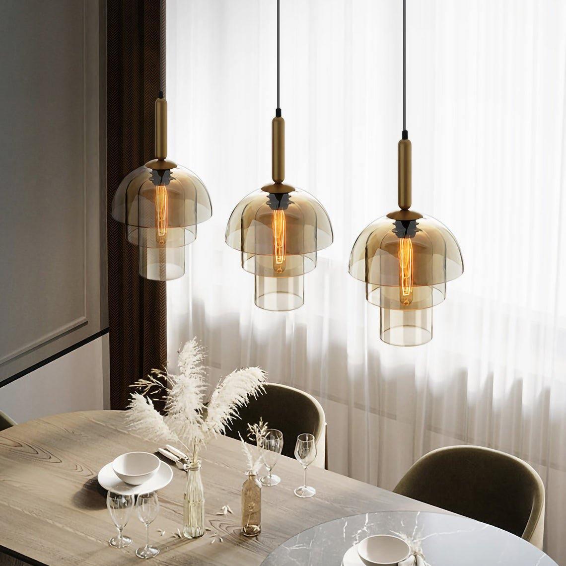 Renley Pendelleuchte aus Glas Cognac Kugel Messing Mid-Century-Stil