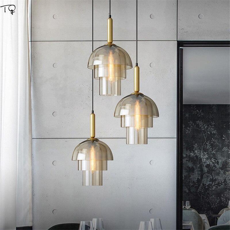 Renley Pendelleuchte aus Glas Cognac Kugel Messing Mid-Century-Stil