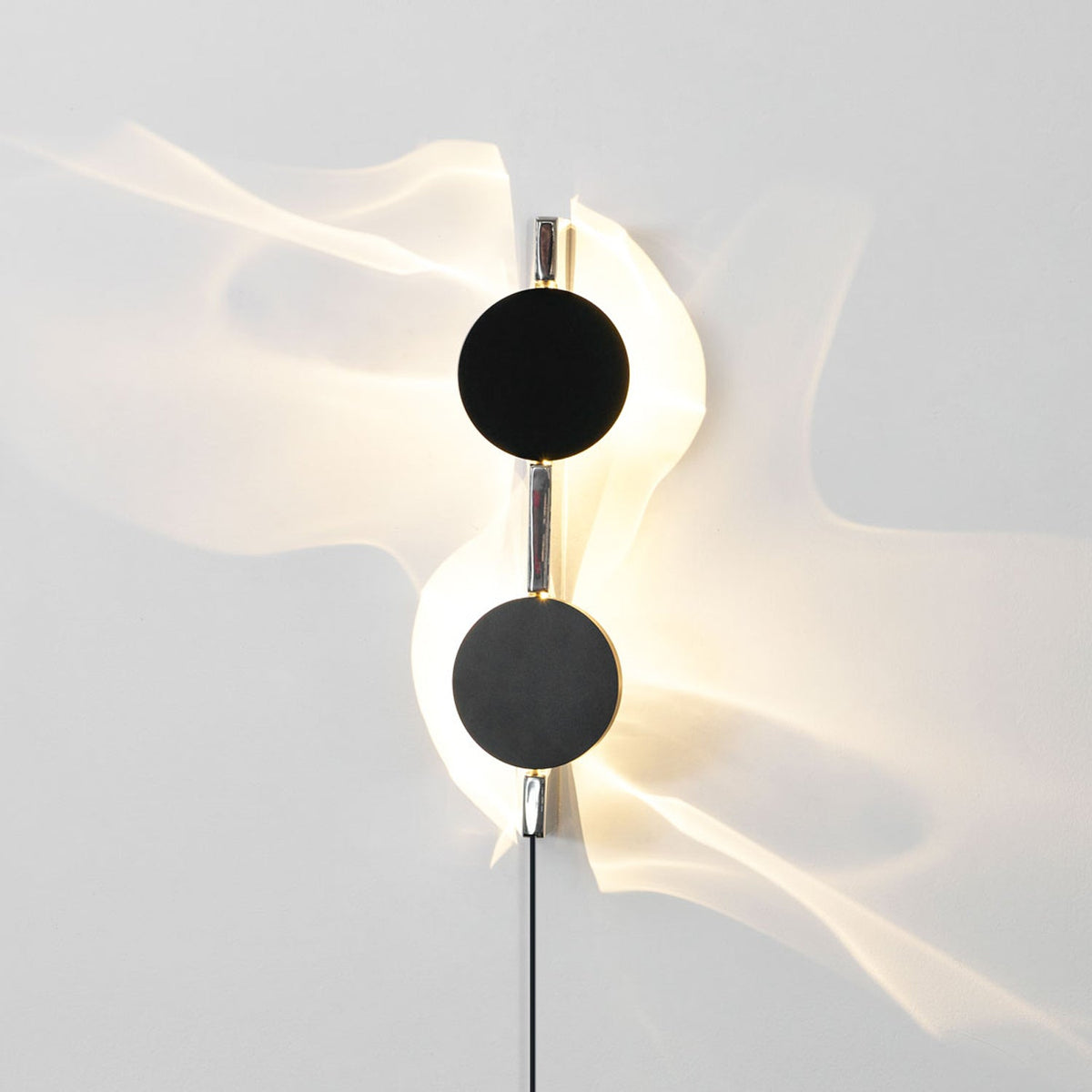 Kinetic Shadow Wandleuchte mit Stecker