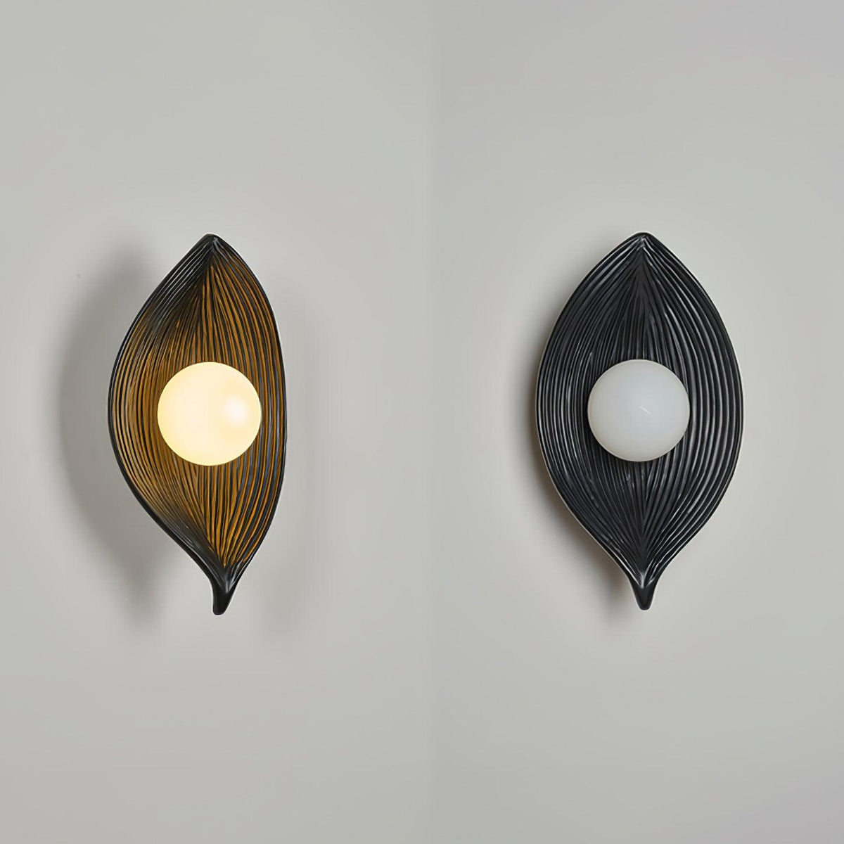 Lirixa Wandleuchte aus Kunstharz in Kieselsteinform