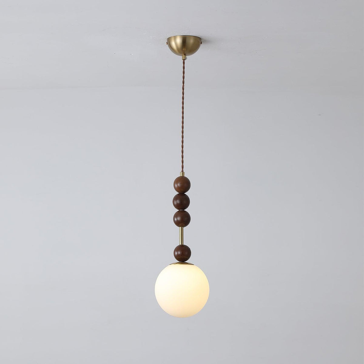 Norn Vintage-Globus-Pendelleuchte mit Holzperlen