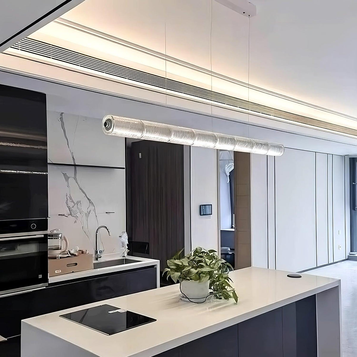 Karoa Linear Pendelleuchte aus transparentem Glas