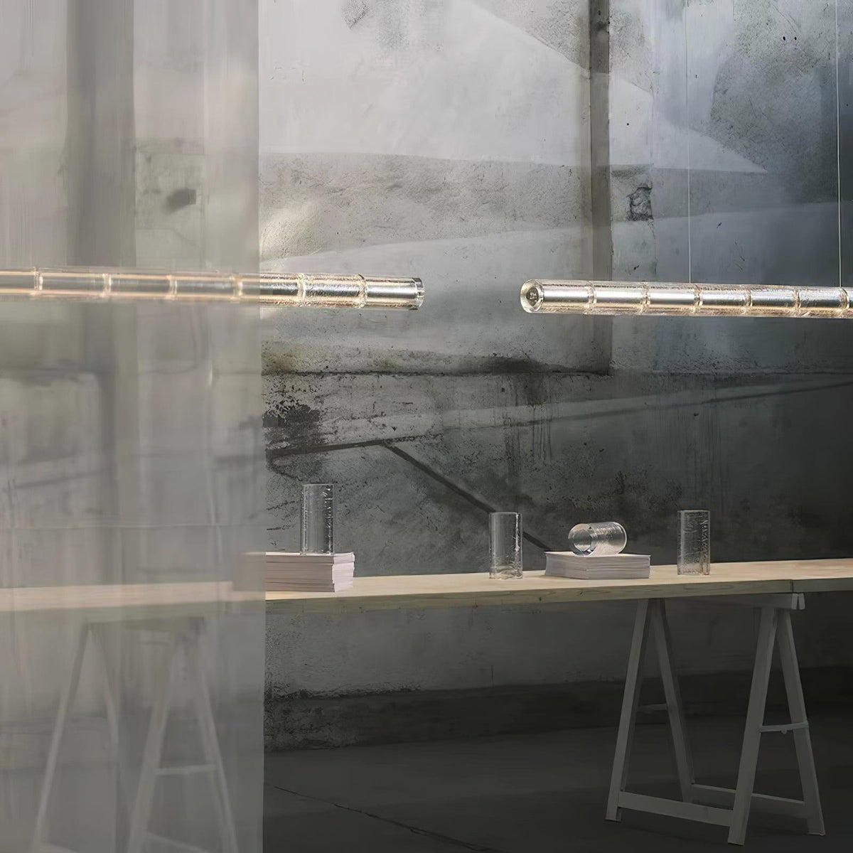 Karoa Linear Pendelleuchte aus transparentem Glas