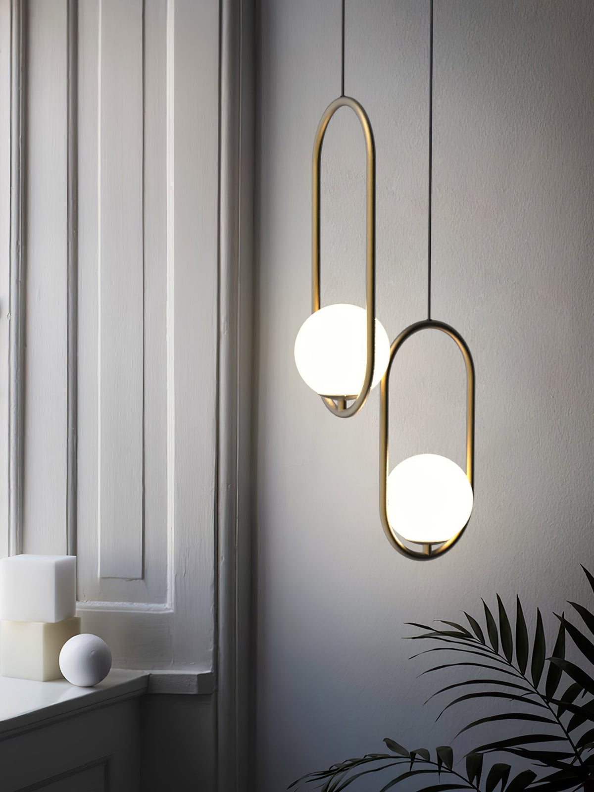 Orieria Pendelleuchte aus Messing im modernen Ringdesign