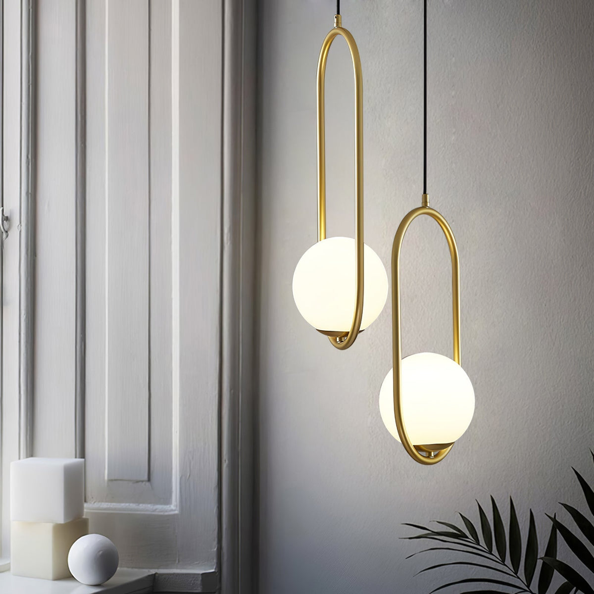 Orieria Pendelleuchte aus Messing im modernen Ringdesign