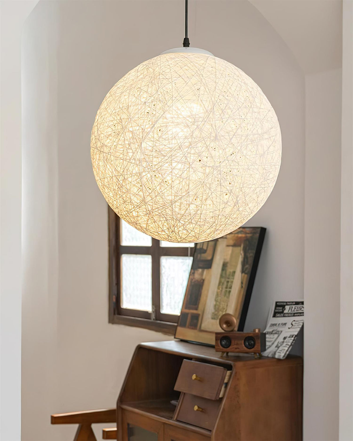 Rovira Pendelleuchte aus Hanf-Rattan in Kugelform im Boho-Stil