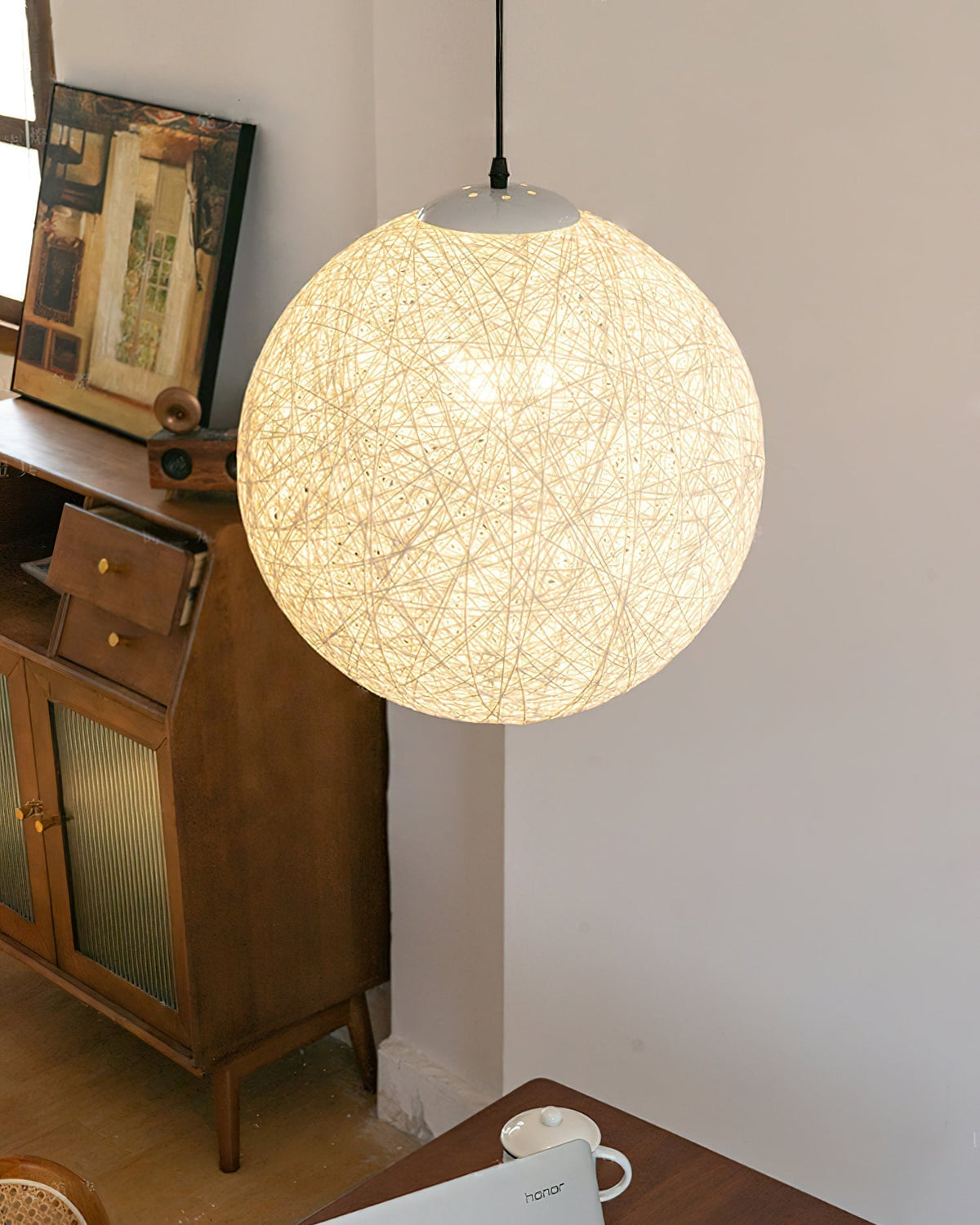 Rovira Pendelleuchte aus Hanf-Rattan in Kugelform im Boho-Stil