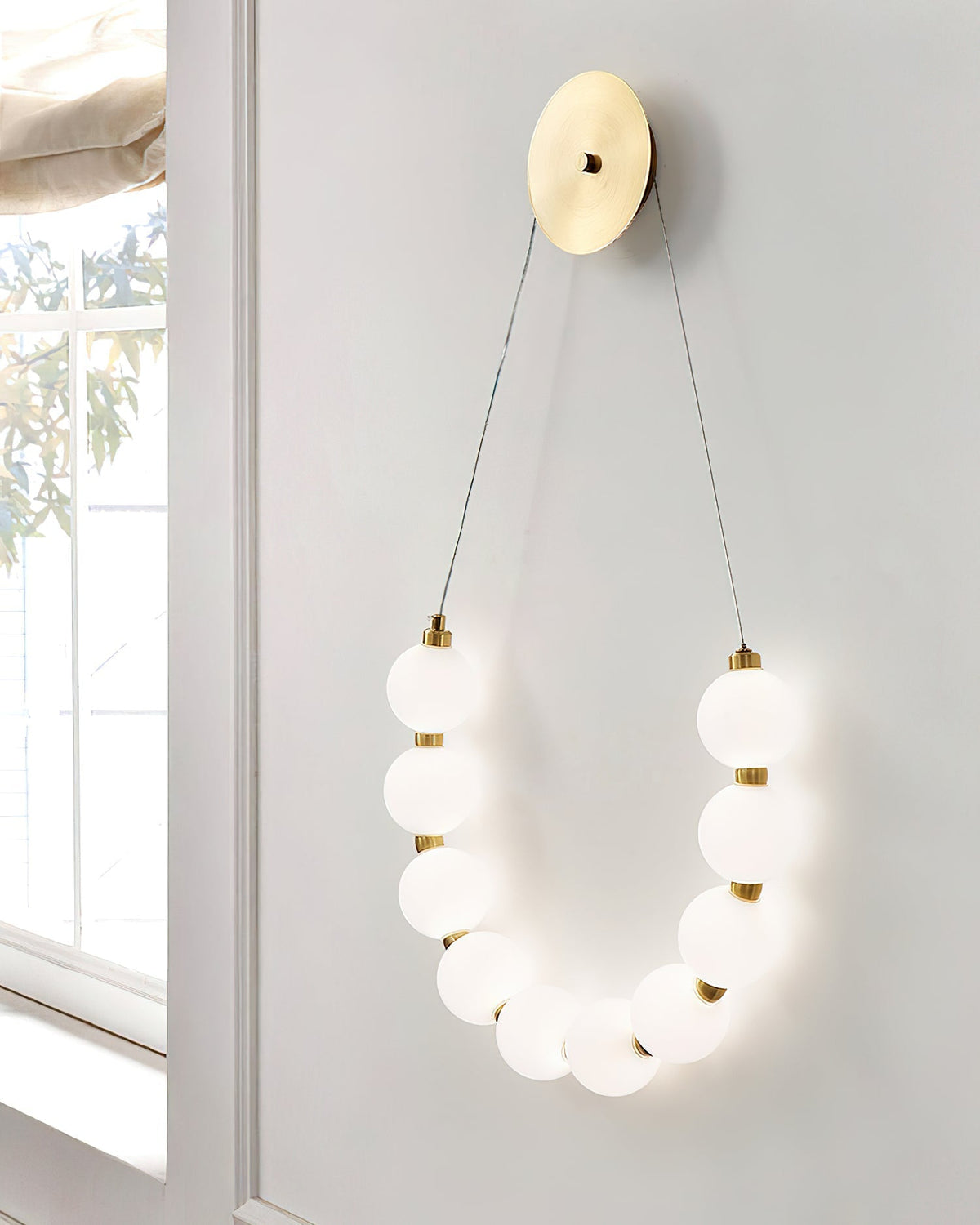 Ilirel Kunst-Ketten-Loop-Messing-Wandleuchte