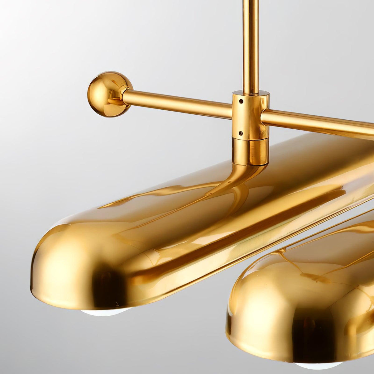 Lyvinaris Geometrische Pendelleuchte aus Messing in linearer Form