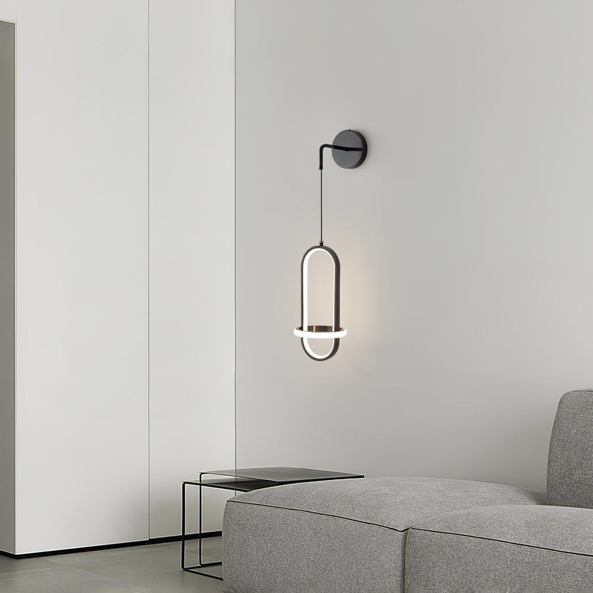 Vivianne zeitgenössische minimalistische ovale Messing-Wandleuchte