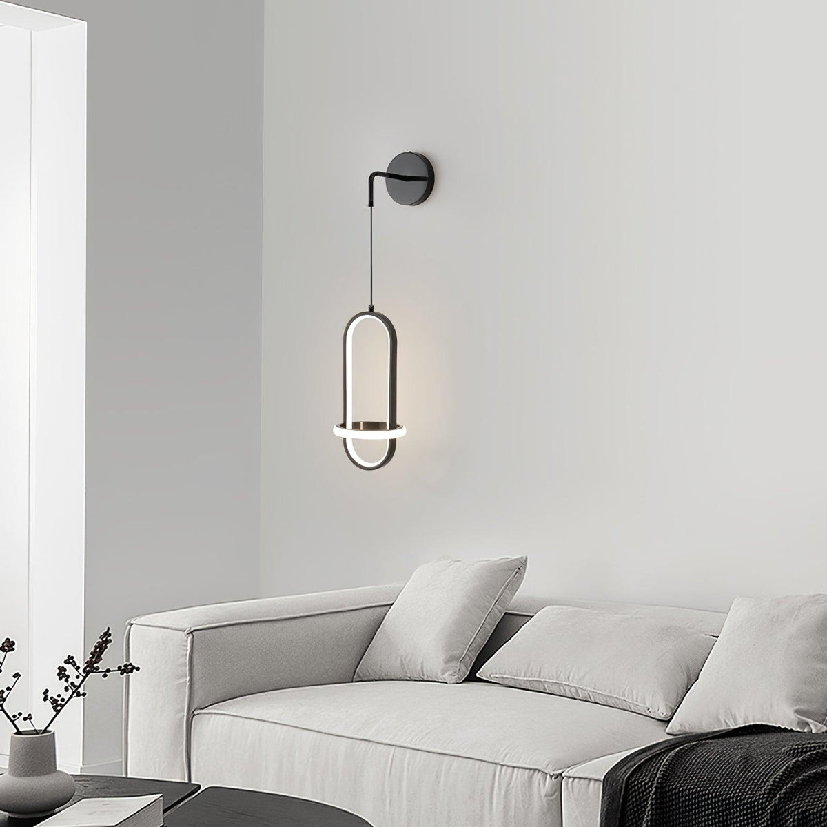 Vivianne zeitgenössische minimalistische ovale Messing-Wandleuchte