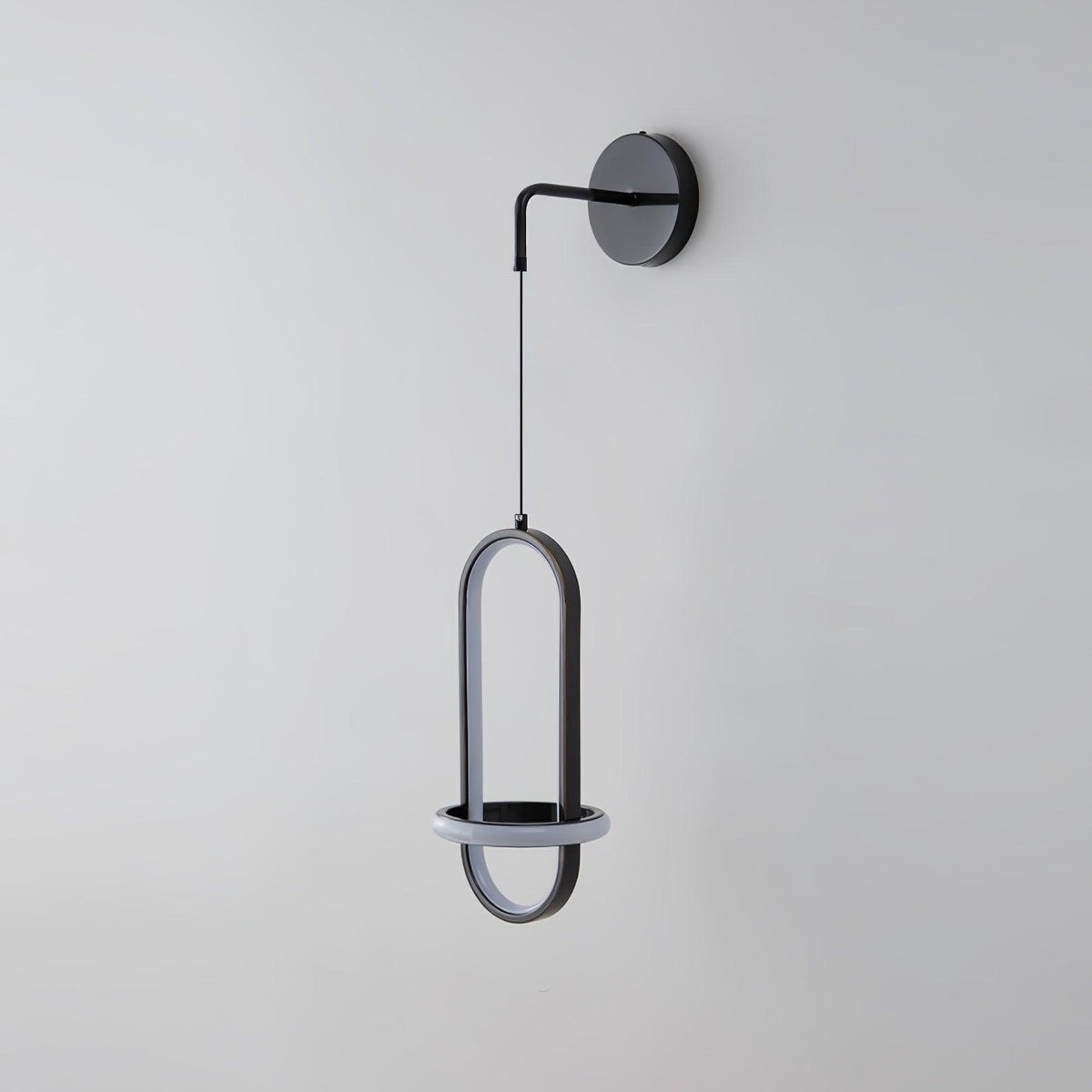 Vivianne zeitgenössische minimalistische ovale Messing-Wandleuchte