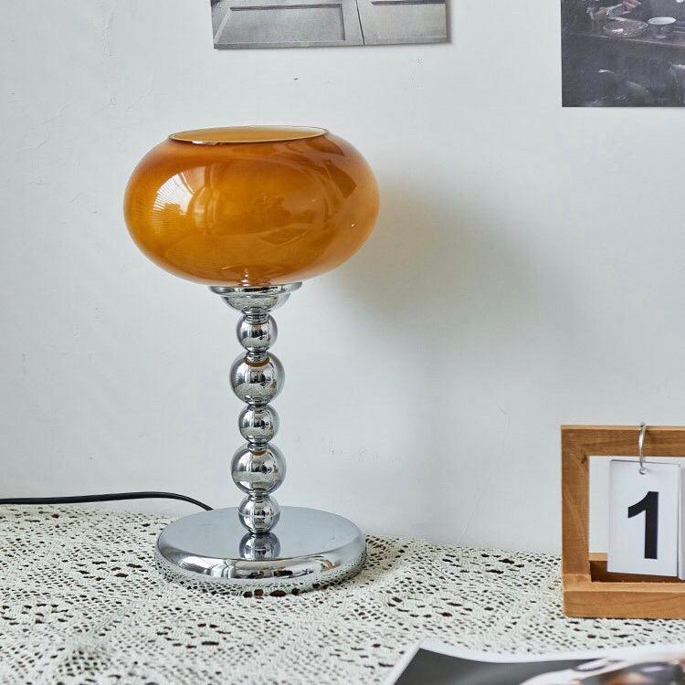 Lioruira zeitgenössische Tischleuchte in Kieselsteinform
