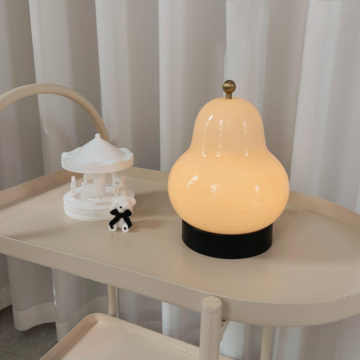 Lumaic Tischleuchte aus Glas mit whimsischem Design