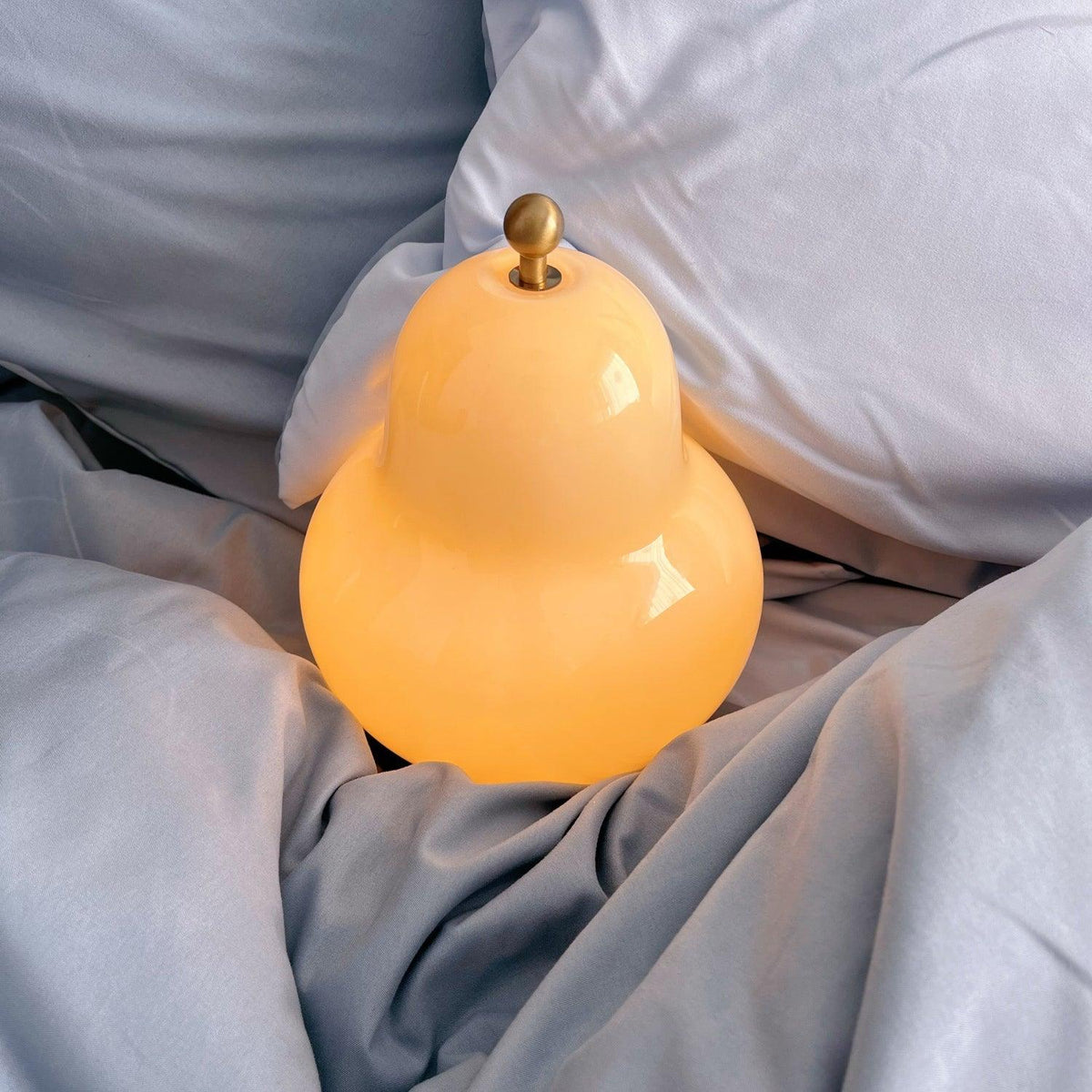 Lumaic Tischleuchte aus Glas mit whimsischem Design
