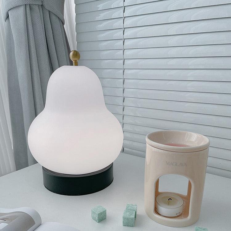 Lumaic Tischleuchte aus Glas mit whimsischem Design