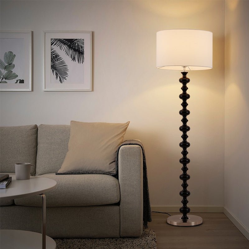 Eloisen Stehleuchte aus Holz und Stoff im minimalistischen Stil
