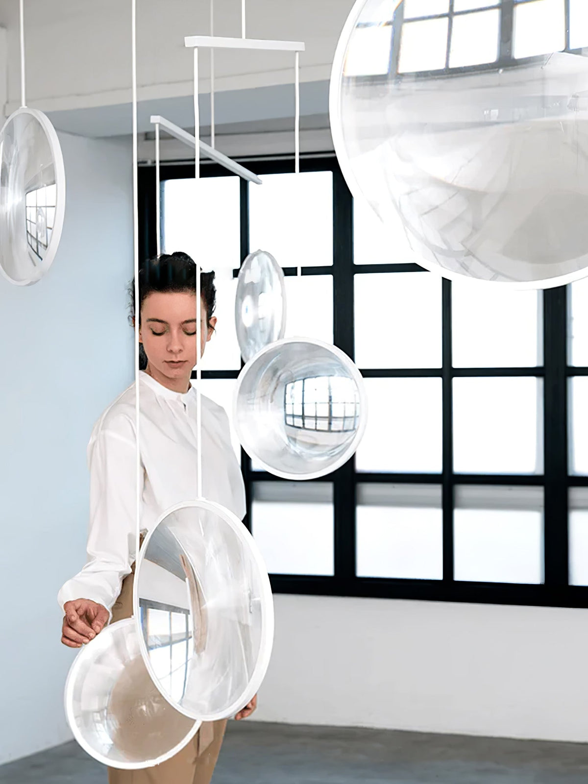 Eirienne Pendelleuchte aus Glas mit künstlerischem Design